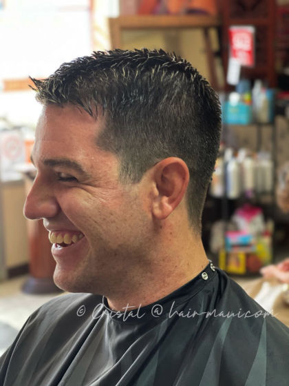Classic men's clipper haircut with clean fade - precision barbering by Cristal D.