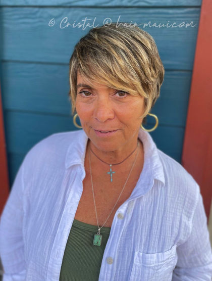 Long pixie haircut for mature women - chic and sophisticated styling by Cristal D.